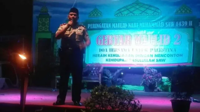 Di Atas Panggung PHBI Maulid Nabi Muhammad SAW, Kapolsek Karawaci Sampaikan Bahaya Narkoba