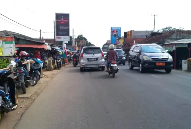 Pasca Perbaikan Oleh PUPR Provinsi Banten Jalan Depan Pasar Baros Mulai Lancar